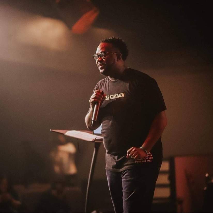 Kevin D. Money preaching from the pulpit