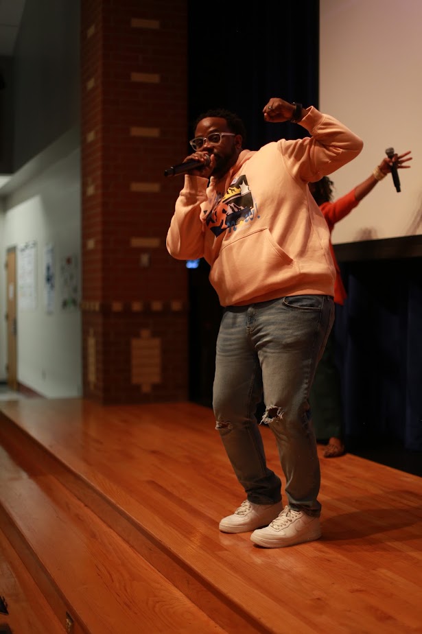 Kevin D. Money energizing a student audience